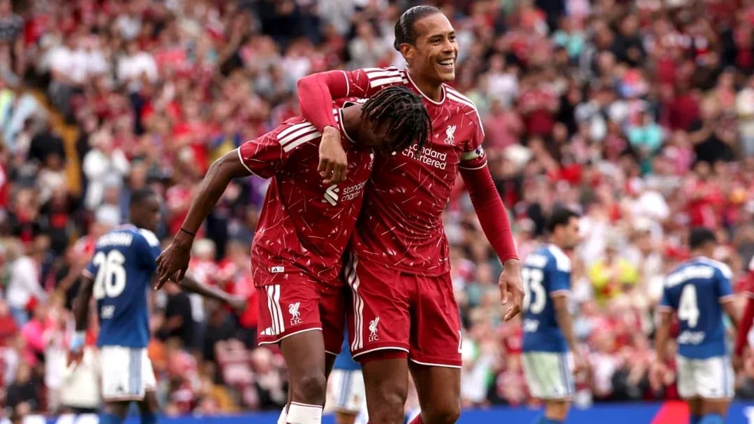 Liverpool players celebrating a goal at Anfield