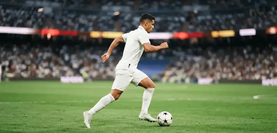 Player sprinting with ball during a match