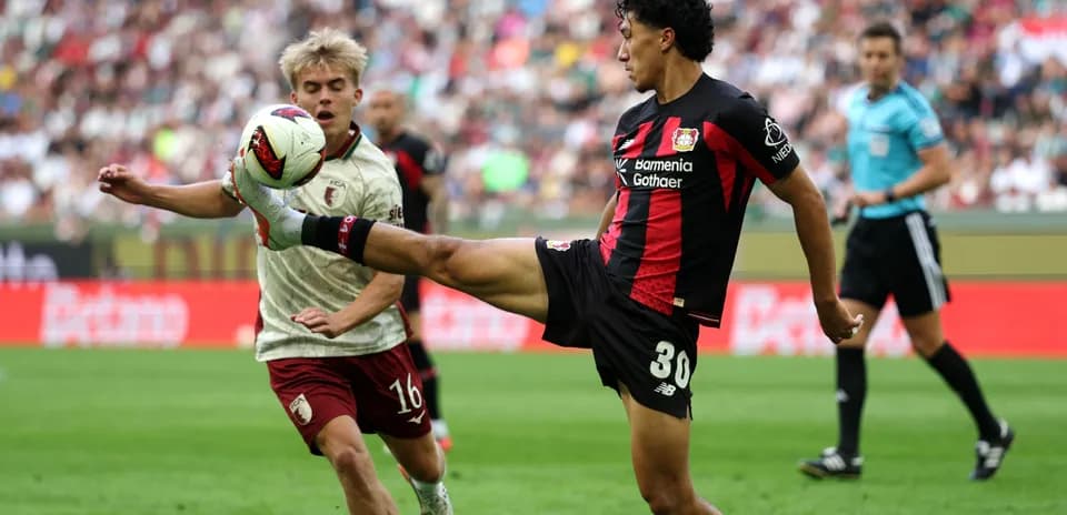 Player from Bayer Leverkusen kicking the ball