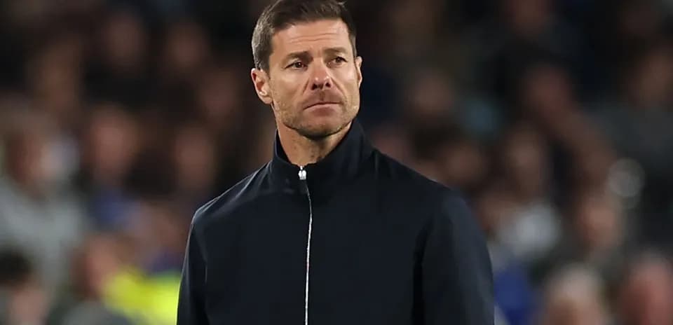 Coach observing the match from the sidelines