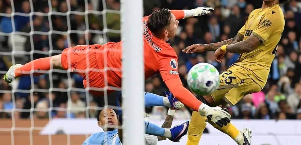 Goalkeeper making a save during match action