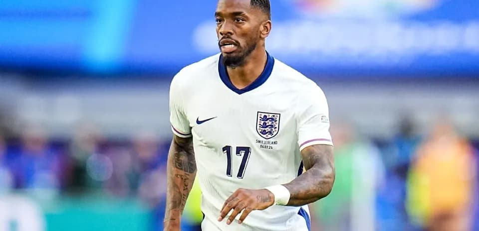 Player wearing England kit during football match