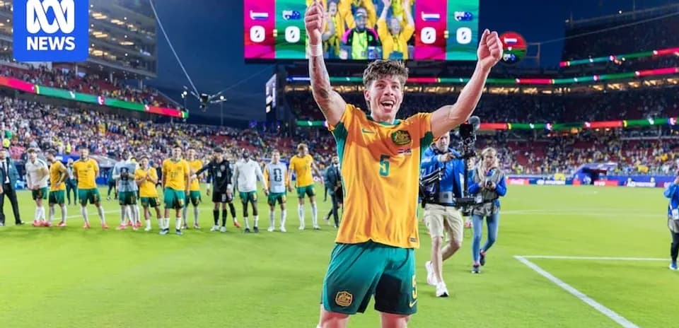 Player celebrating with teammates after match victory