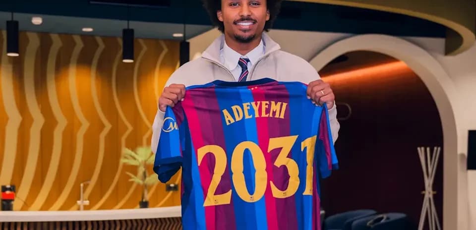 Player holding Barcelona jersey with Adeyemi and 2031