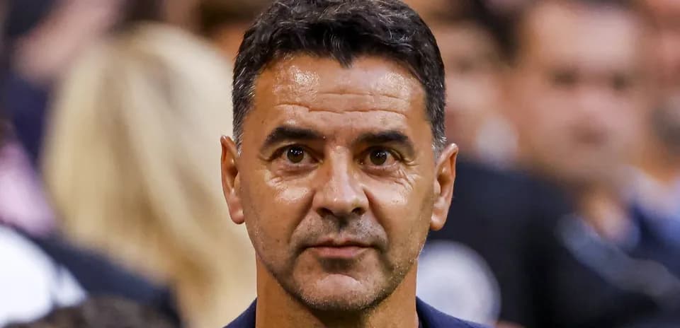 Coach observing during a sporting event