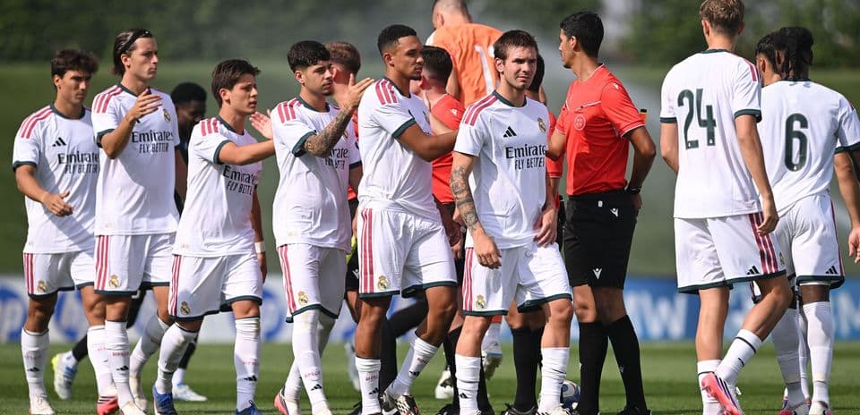 Real Madrid players greeting officials before match