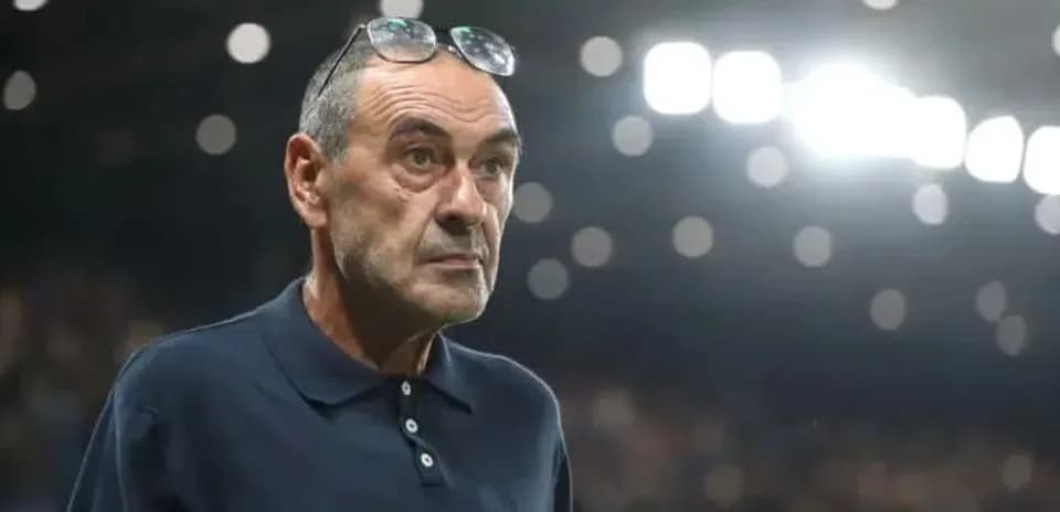 Coach observing the match from the sidelines