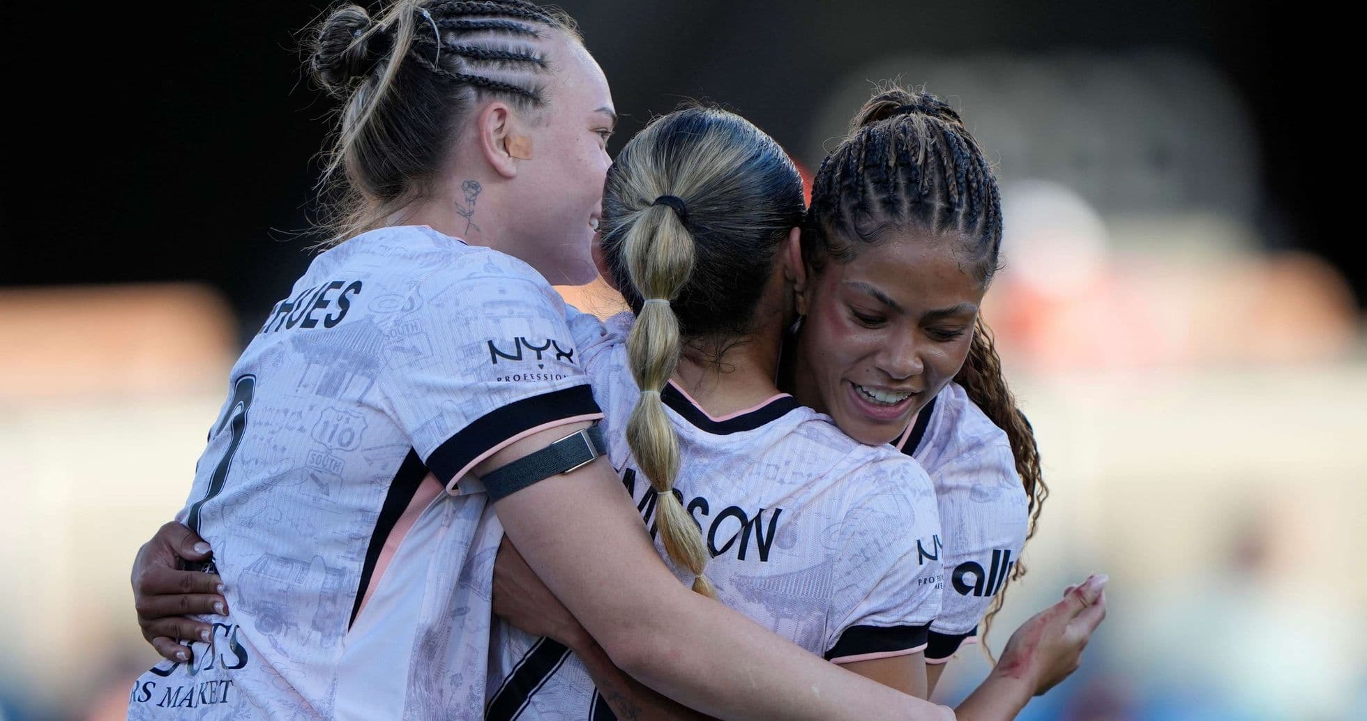 Players celebrating after scoring a goal
