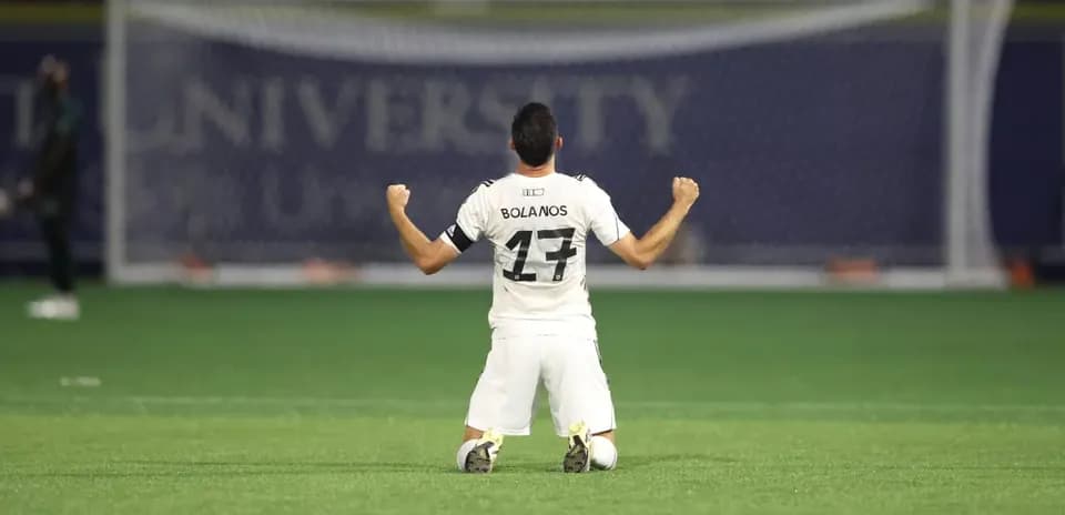 Bolanios celebrating after scoring a goal