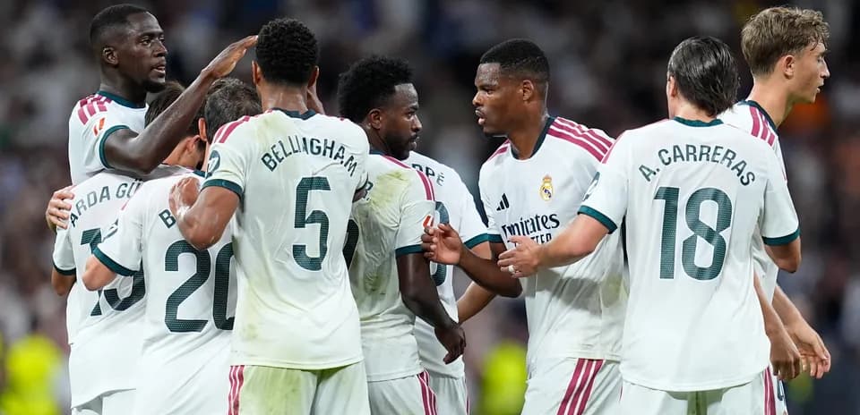 Real Madrid players celebrating a goal during match