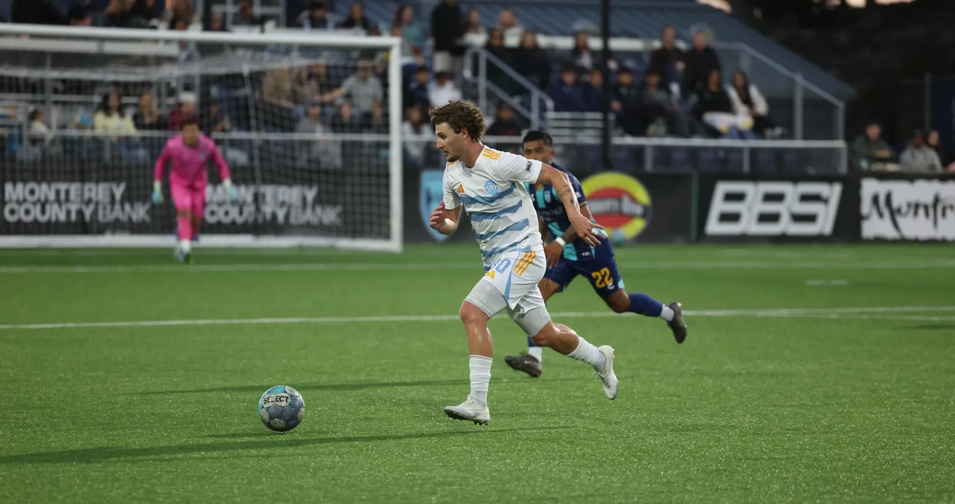 Monterey Bay player sprinting with the ball