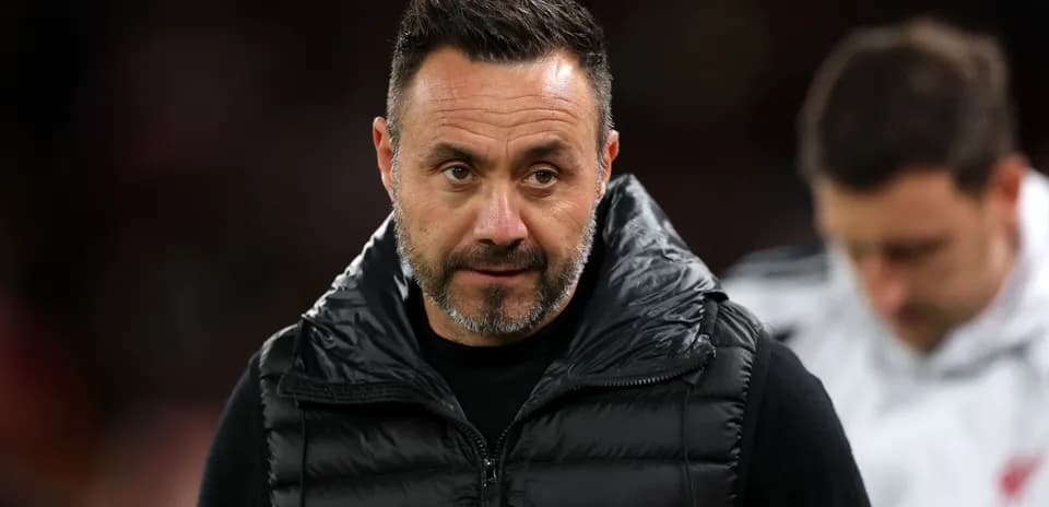 Coach on the sidelines during a match