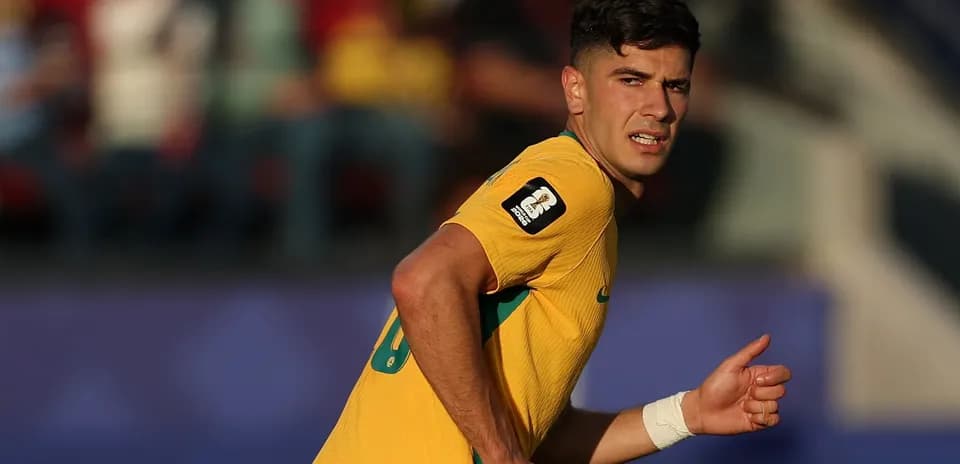 Player in yellow jersey running on the field