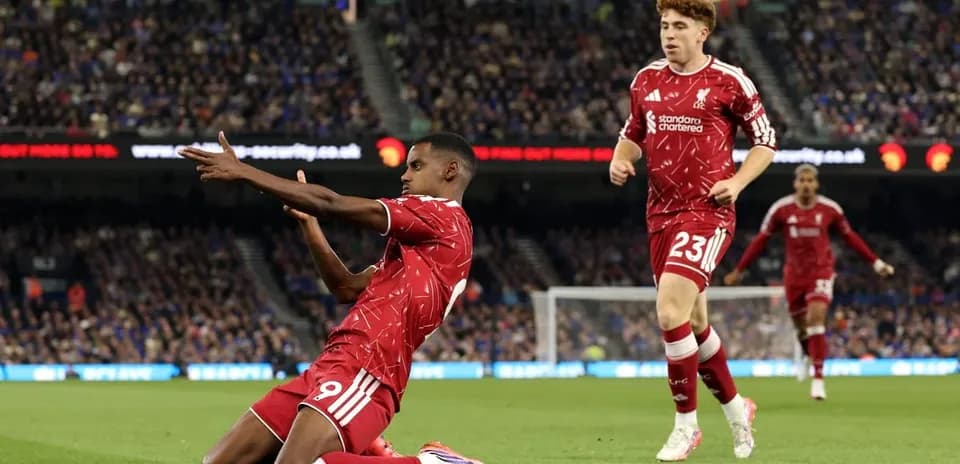 Liverpool players celebrating a goal during match