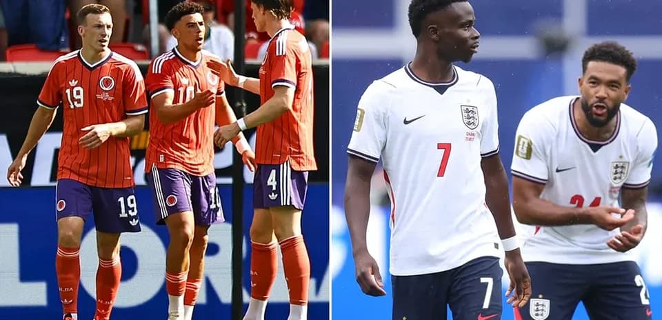 Colombian and English players interacting on the field