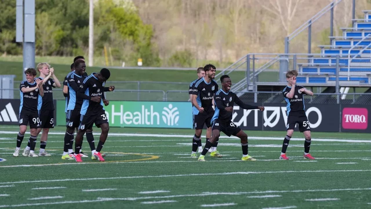 Minnesota United II players celebrating on the field