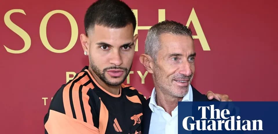New player posing with club representative at announcement