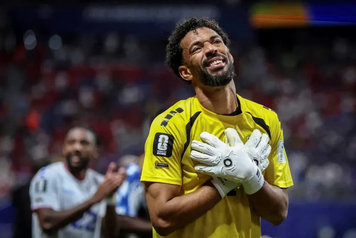 Goalkeeper celebrating with hands on heart