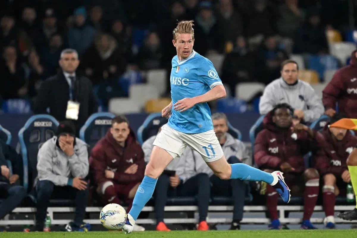Player in light blue kit running with ball