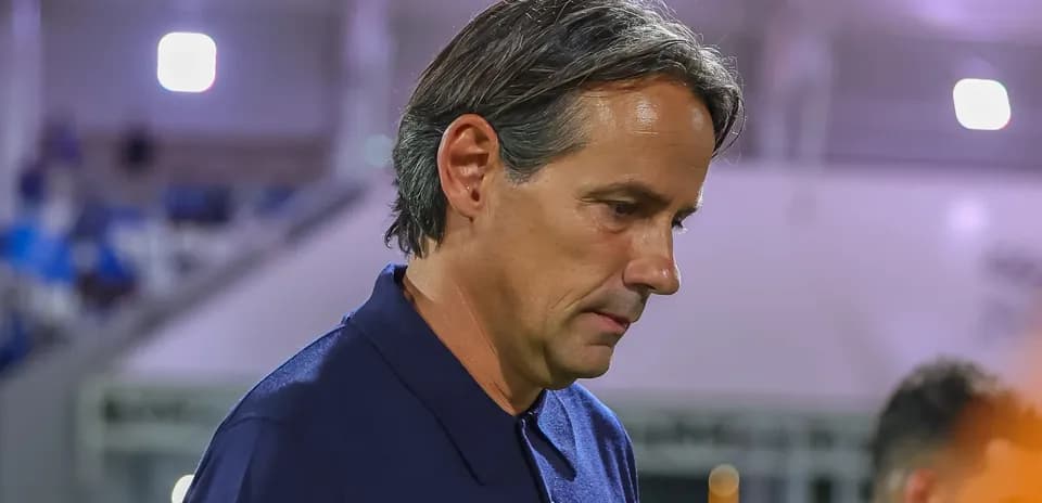 Coach walking on the sideline during match
