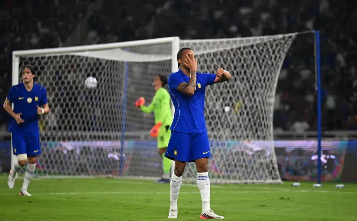 Player in blue jersey reacting during soccer match