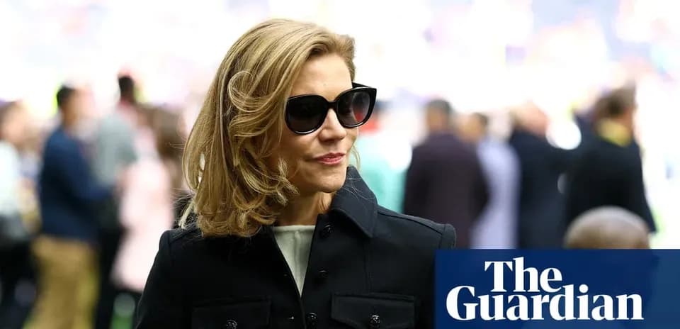Woman in sunglasses at sports event venue