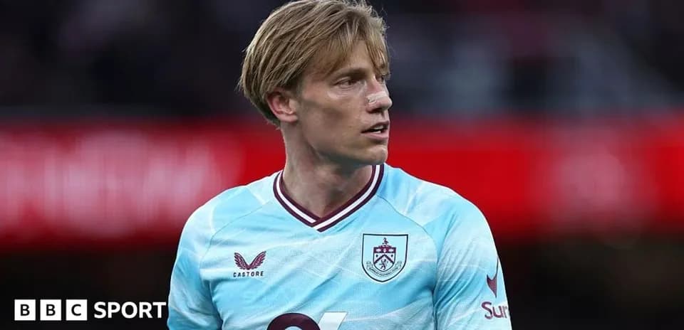 Burnley player during match with injury on face