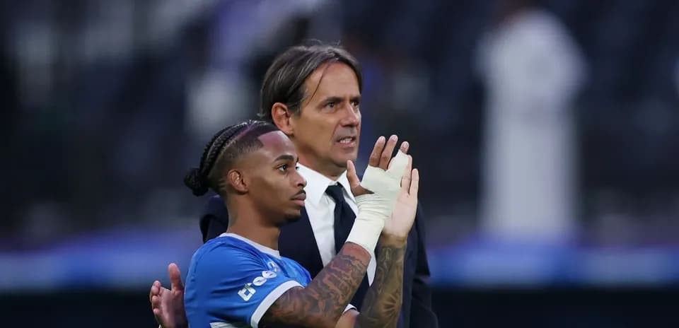 Player and coach acknowledging the crowd after match