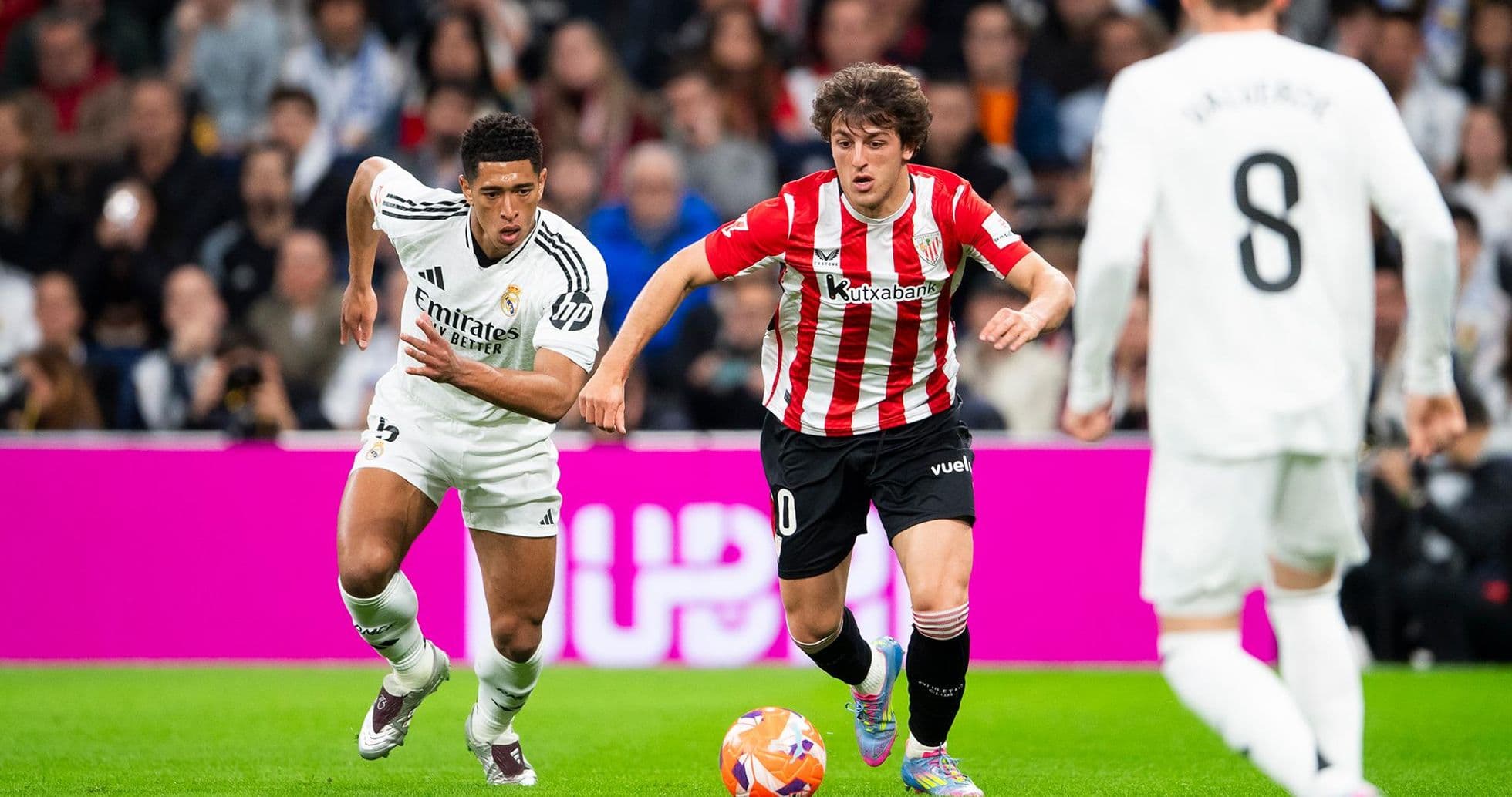 Real Madrid player chasing Athletic Club midfielder