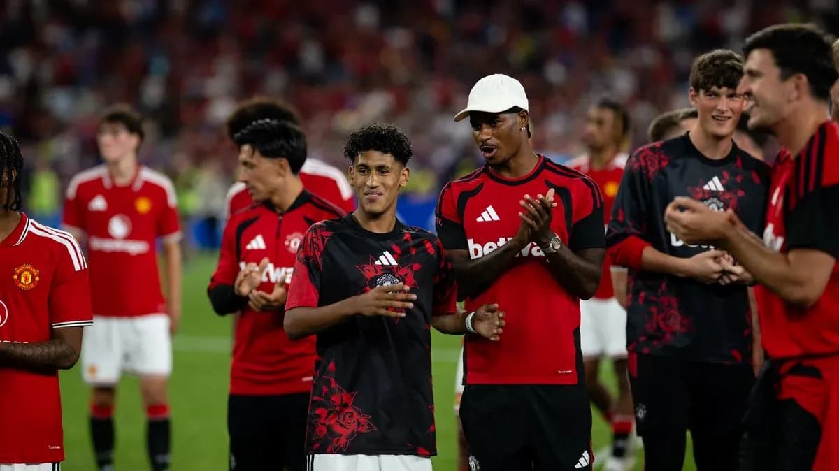 Manchester United players celebrating after match