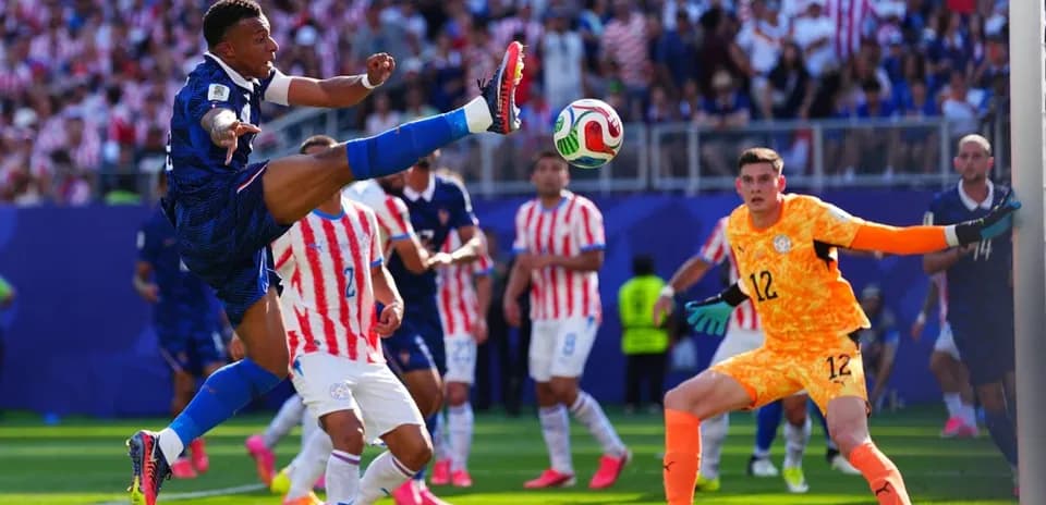 Player attempting a kick during a soccer match