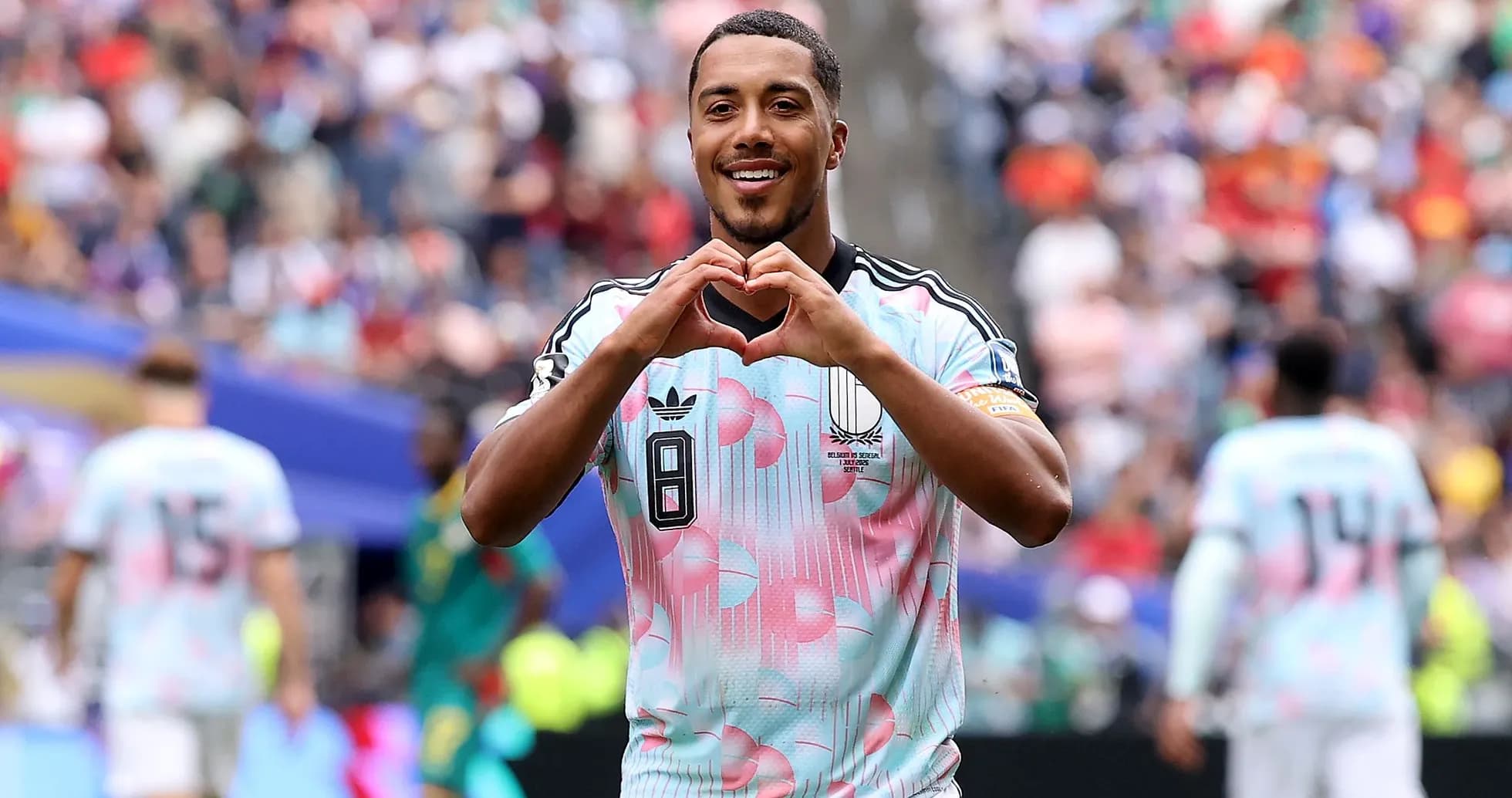 Player celebrating by making a heart gesture