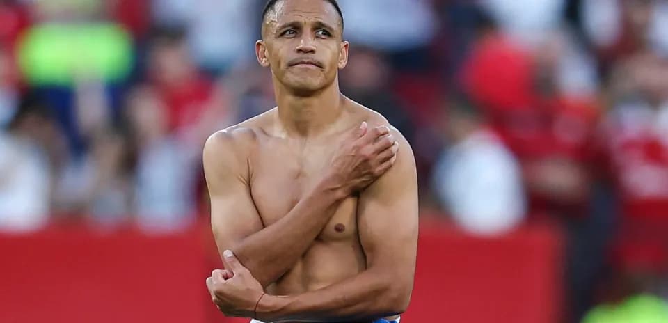 Player with bare torso on the field after match