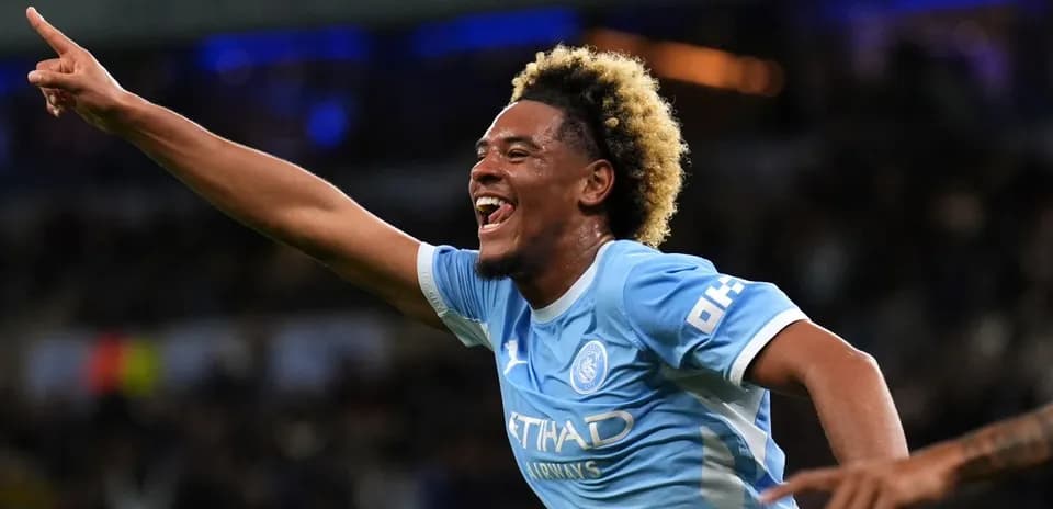 Player celebrating goal with raised finger
