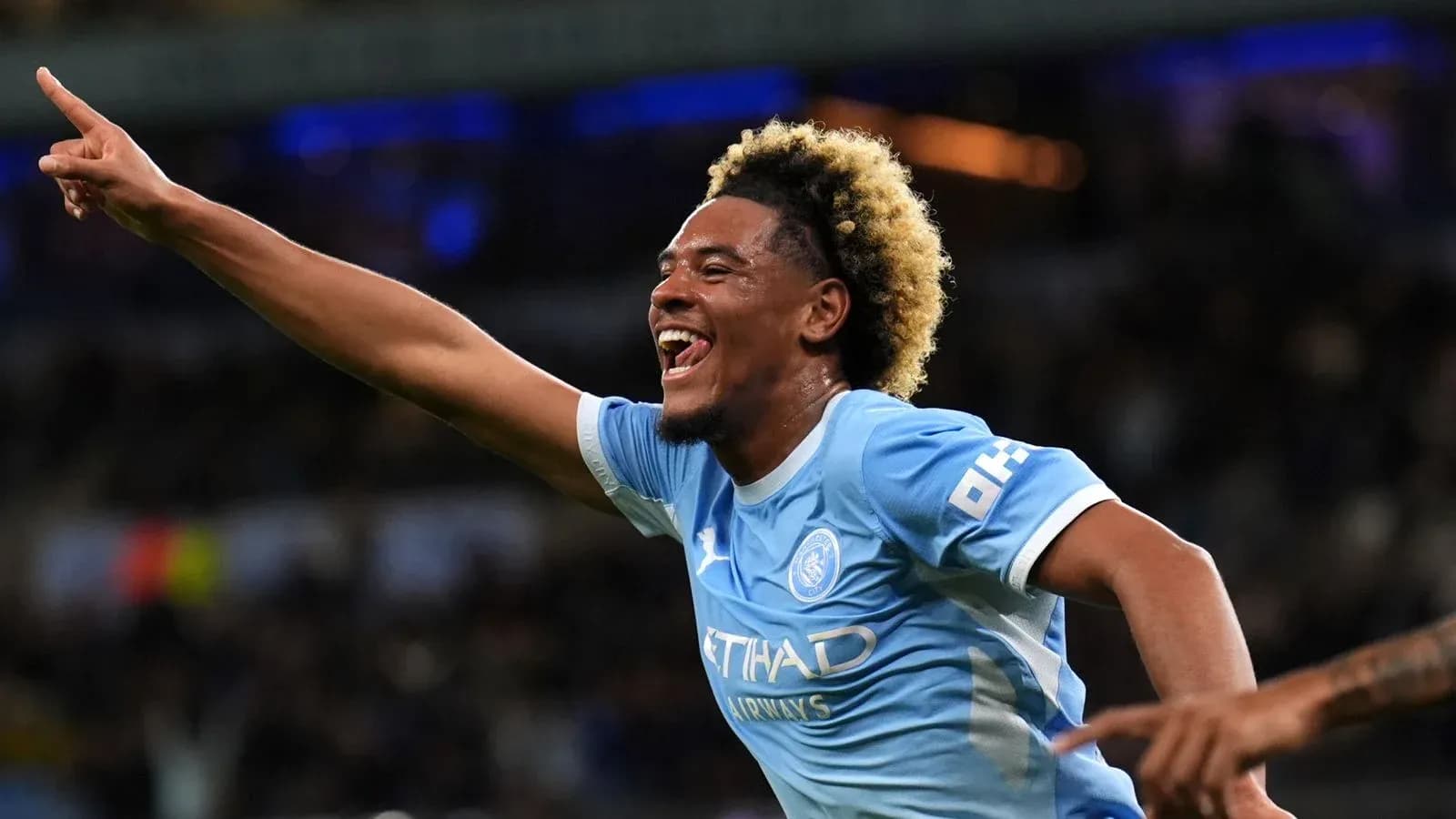Player celebrating goal with raised finger
