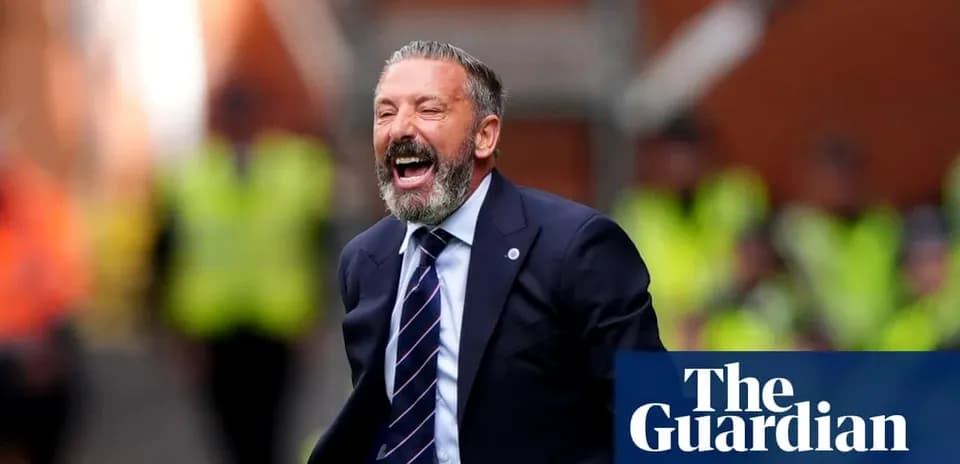 Manager celebrating enthusiastically during a match