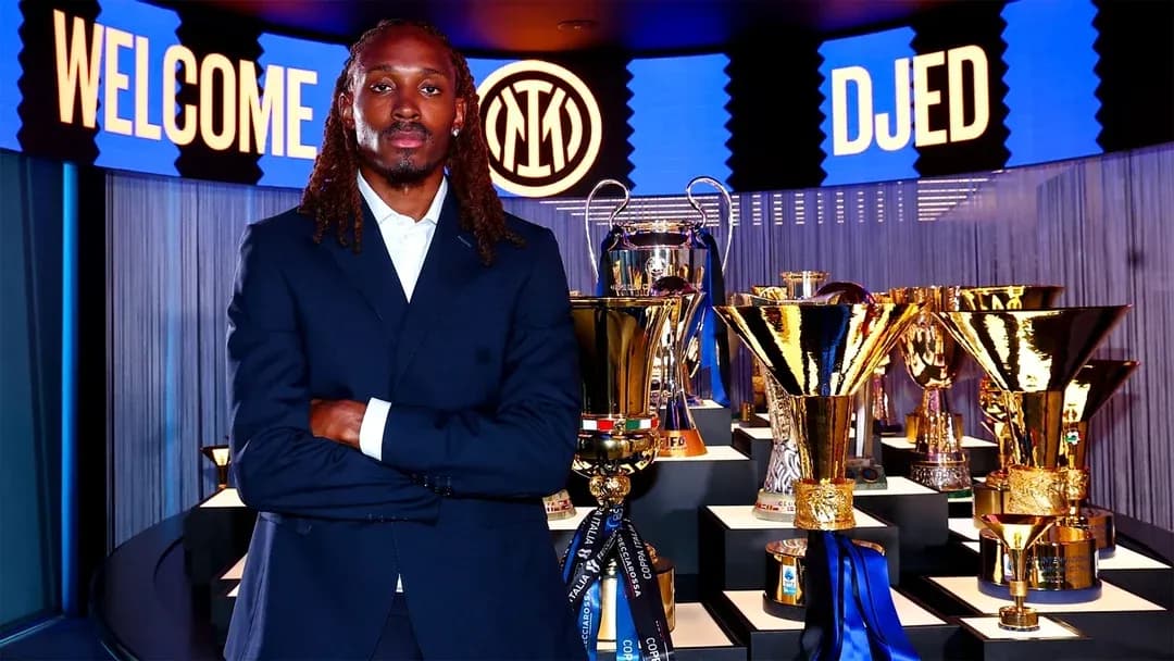 New player standing in front of trophies display
