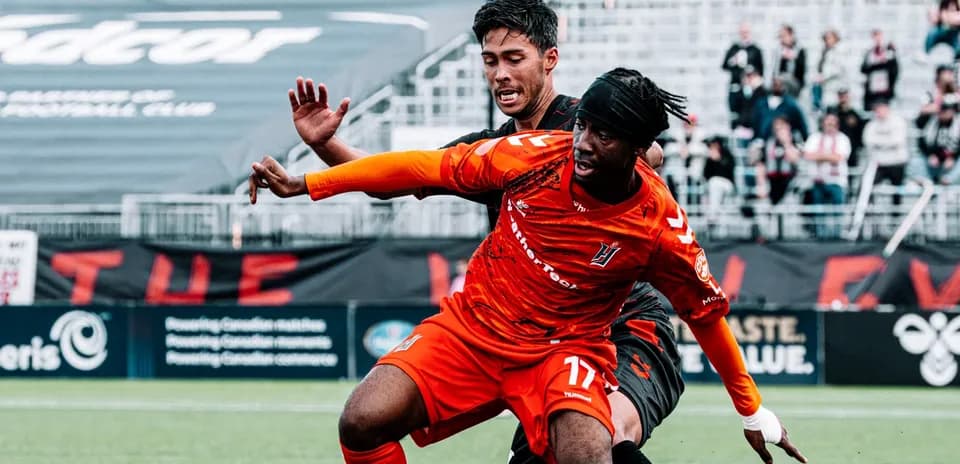Players competing during Vancouver FC match