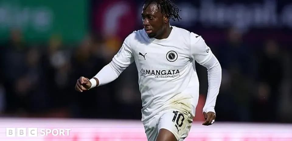 Player celebrating a goal on the field