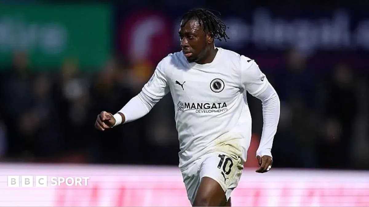 Player celebrating a goal on the field