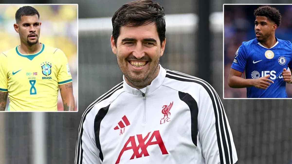 Liverpool coach smiling during training session