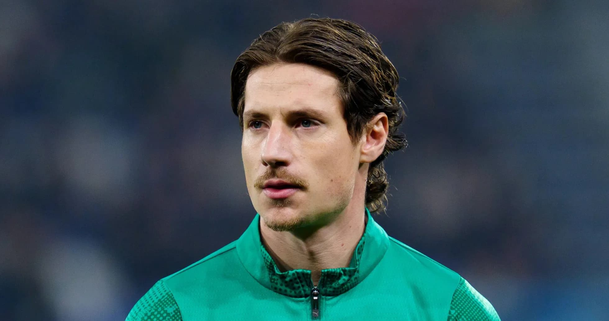 Goalkeeper in green kit before the match
