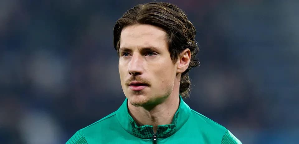 Goalkeeper in green kit before the match