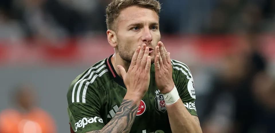 Player celebrating with hand gestures on the field