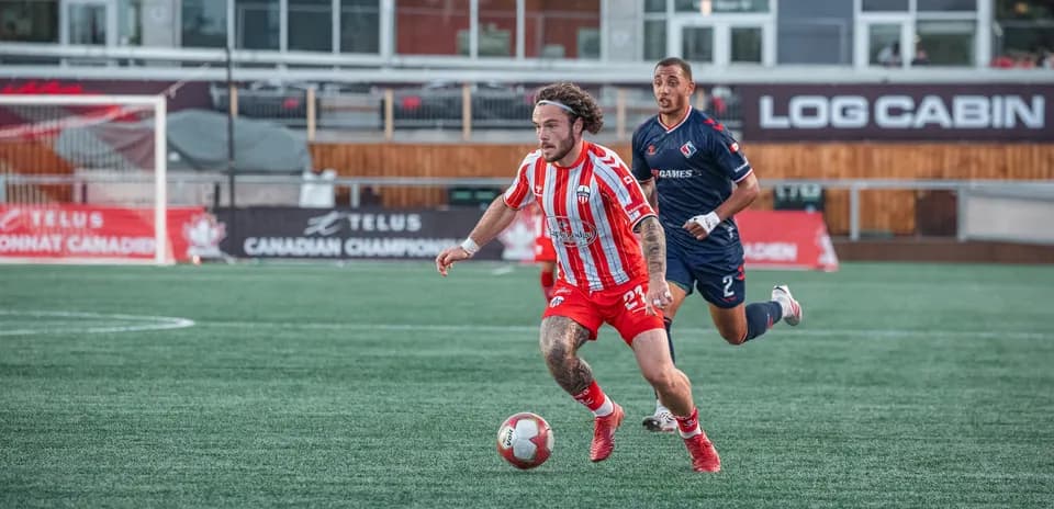 Player dribbling the ball during match