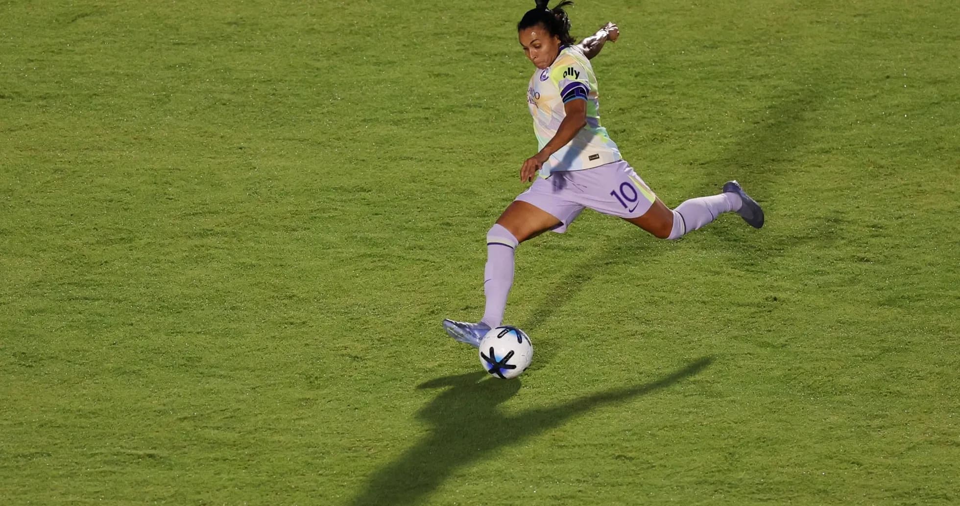Player kicking ball during Racing Louisville match