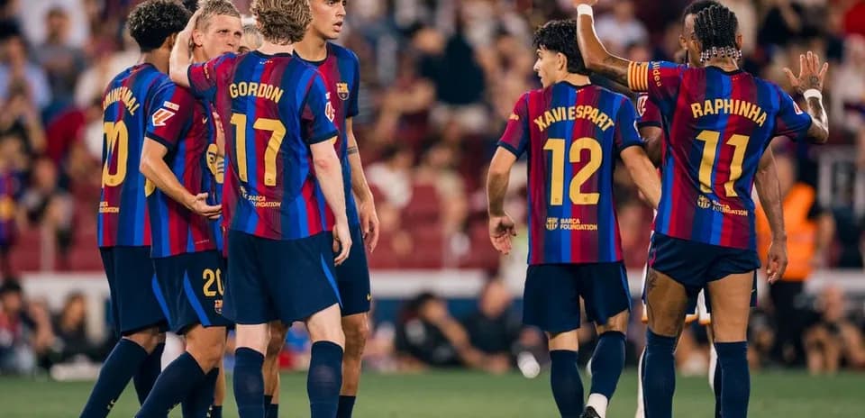 Barcelona players celebrating during La Liga match
