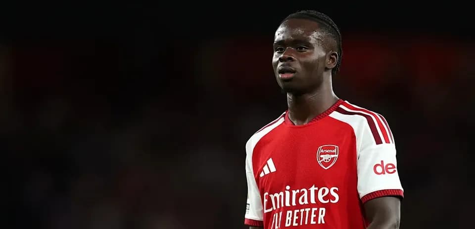 Player in Arsenal jersey during match at stadium