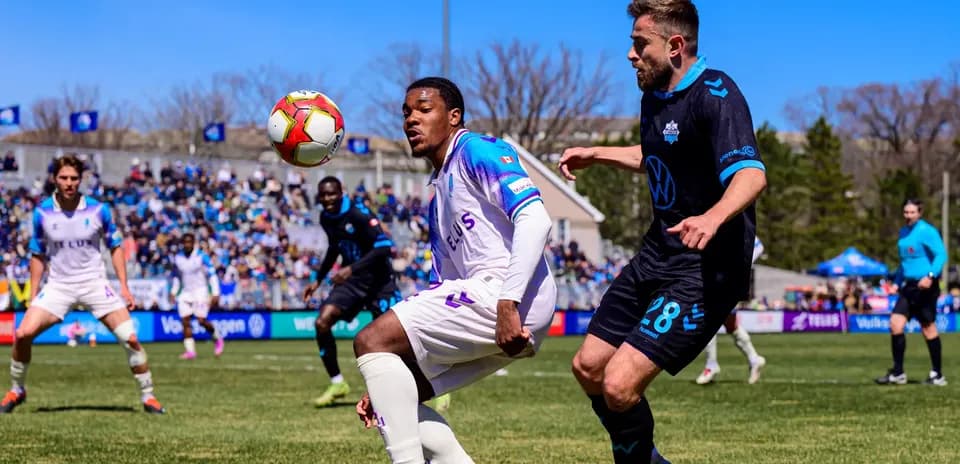 Player kicking ball during HFX vs Pacific match