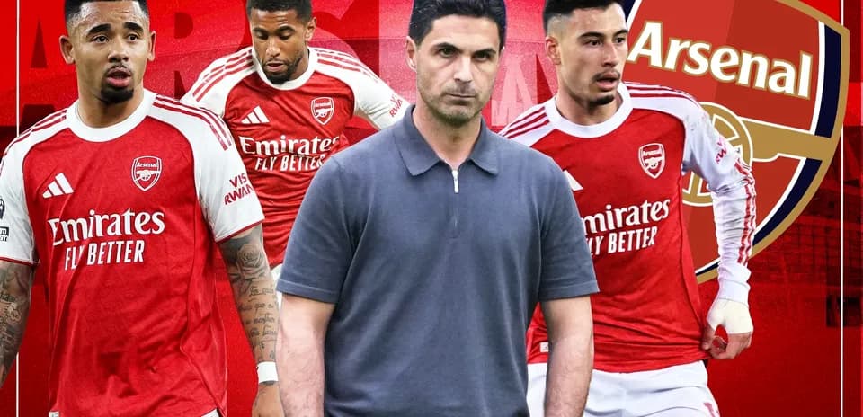 Arsenal players and manager in red team kits
